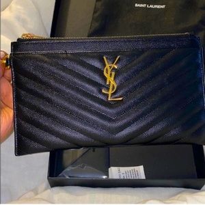 YSL Large Bill Pouch in Black and gold hardware. Good used condition. Authentic.